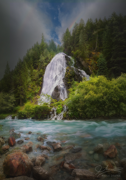 Schleierfall Waterfall | A lovely surprise waterfall on the side of the road leading to the town of Kals Am Grossglockner, Austria, on the Lesach river.
<br>
