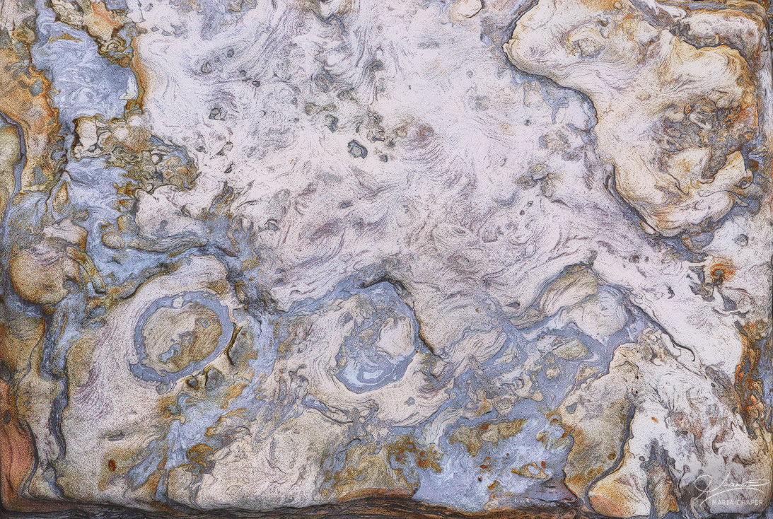 Sea Treasures | Interesting rock with blue and red design and pattern